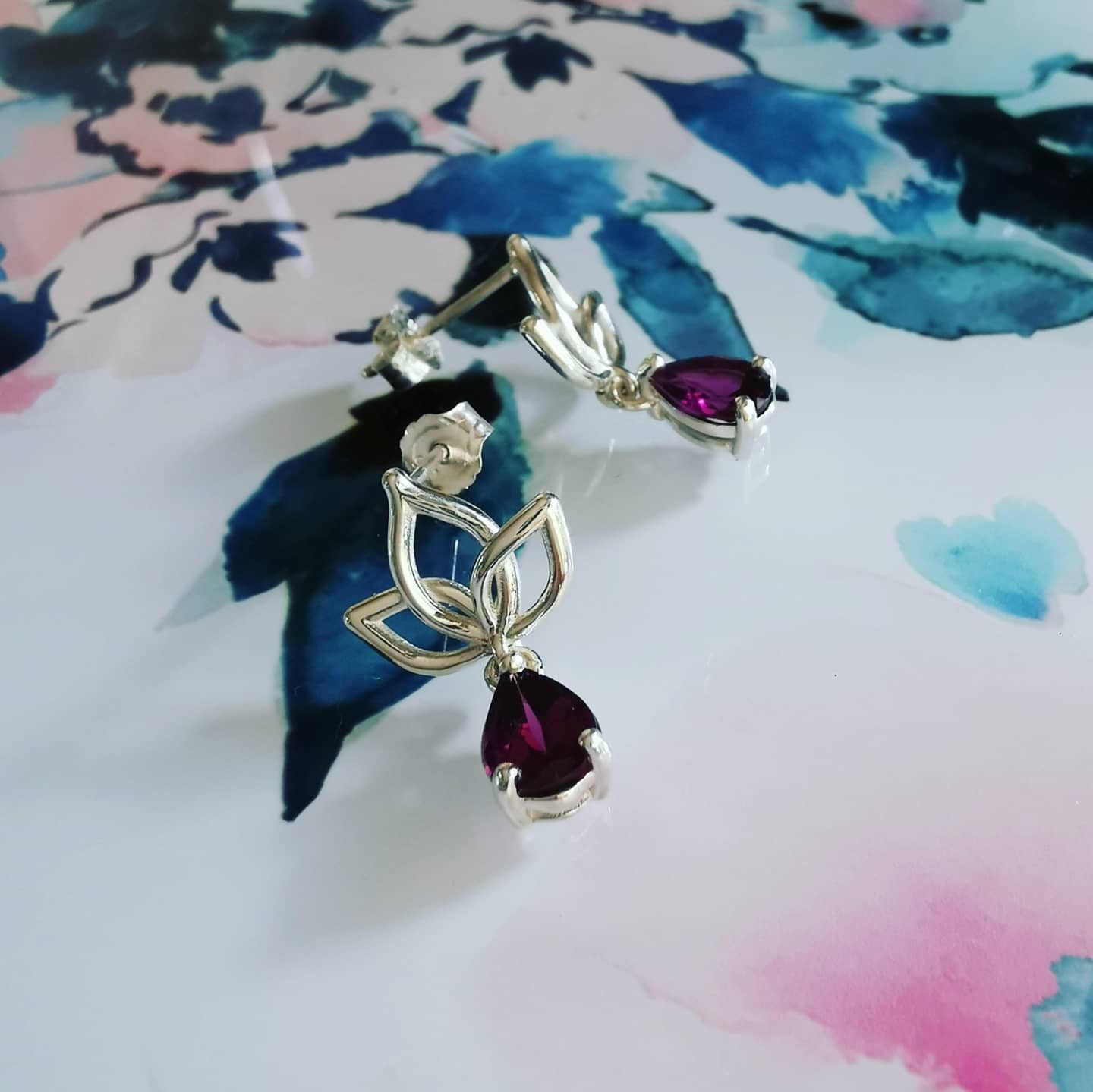 Stylish Rhodolite Pear Cut Rhodolite Garnets Dangling from Silver Lotus Studs