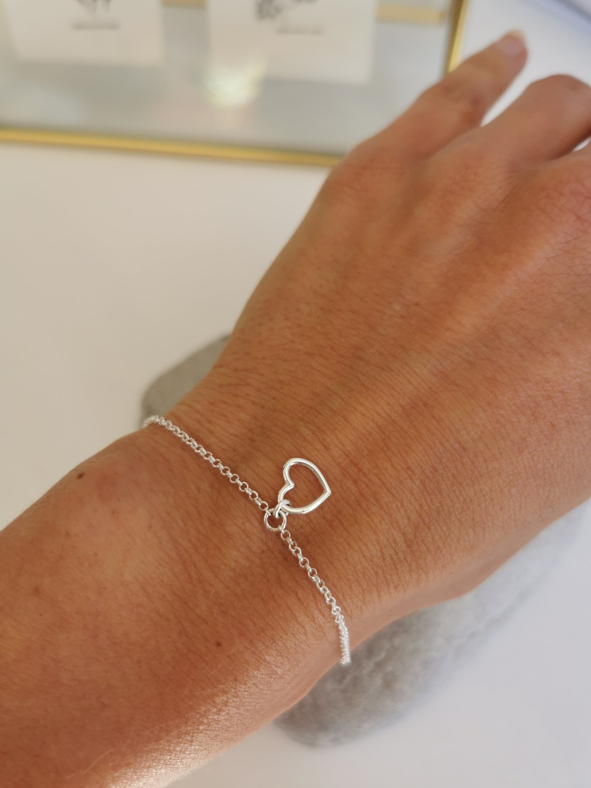 Delicate Silver Bracelet with Open Heart Chain in the centre