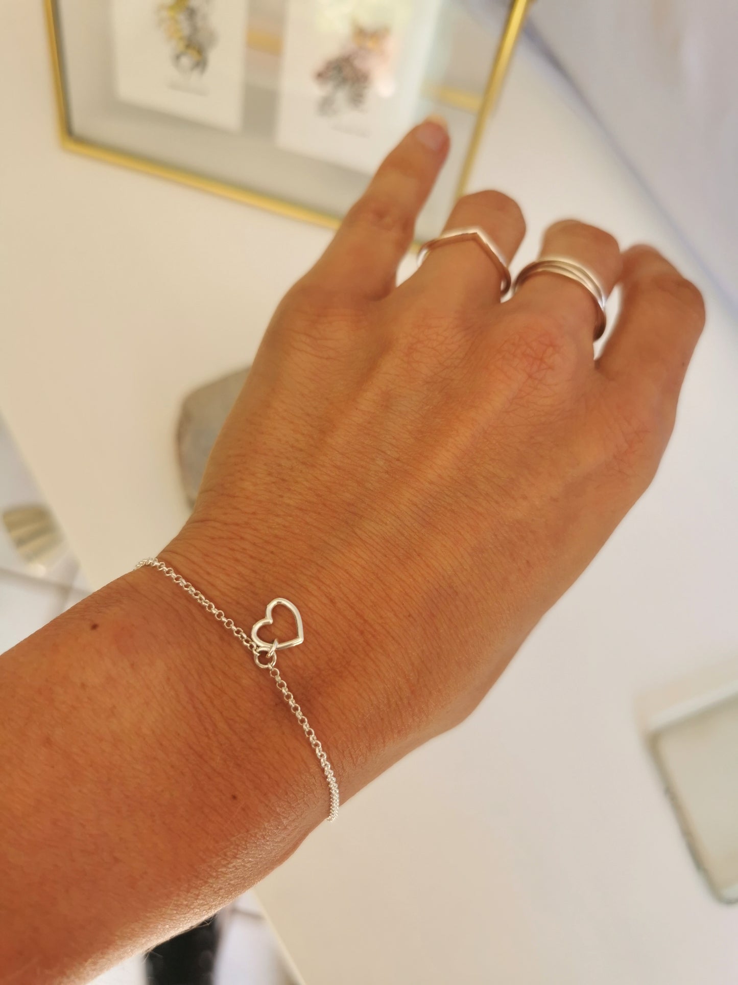 Delicate Silver Bracelet with Open Heart Chain in the centre